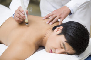 Chinese patient receiving moxibustion